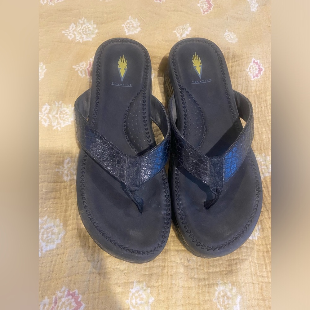 Size 9 Volatile brand flip flops.